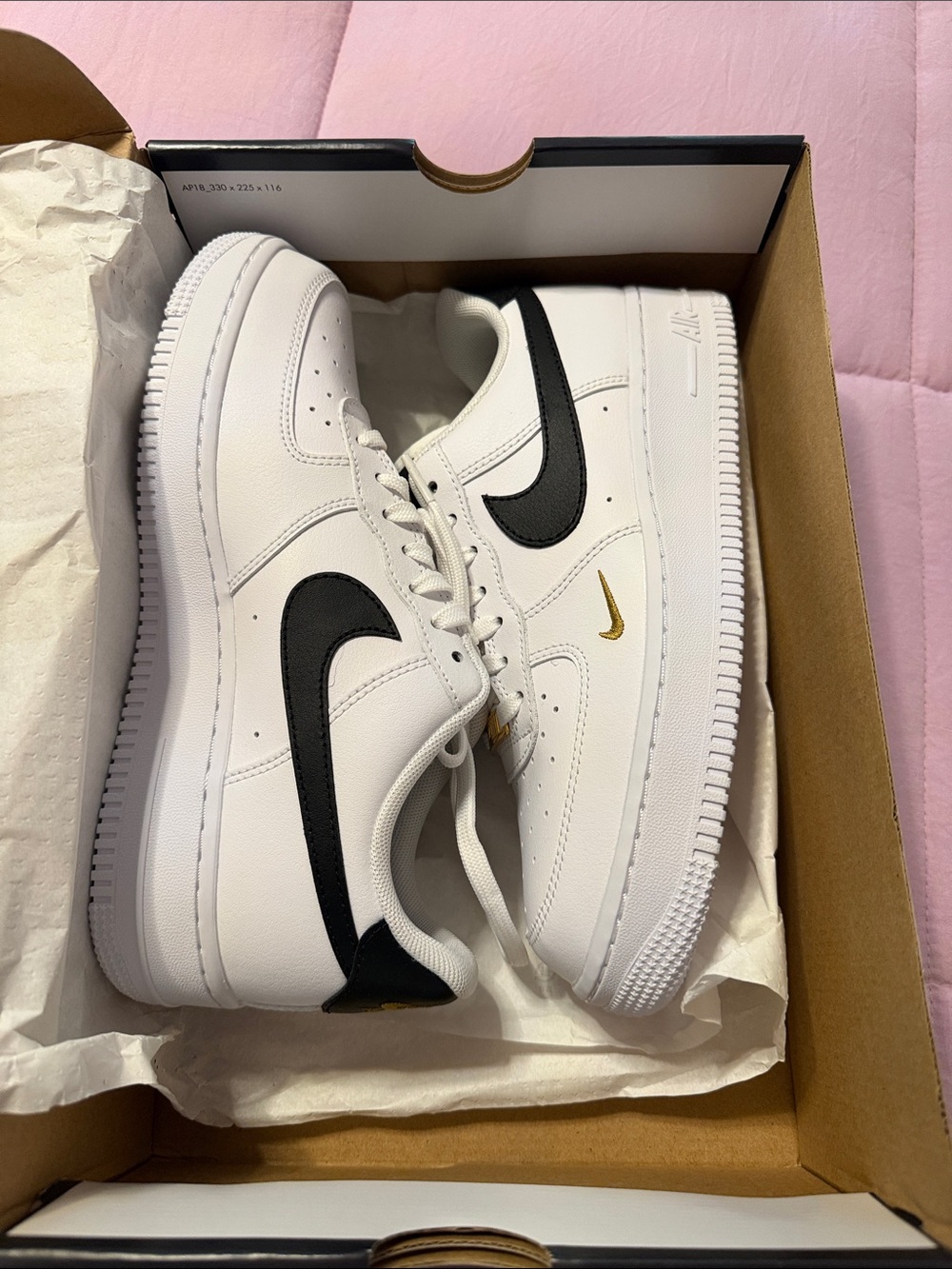 Nike Air Force1.White Leather Low-Top Sneakers with Black Swoosh and Gold Accent